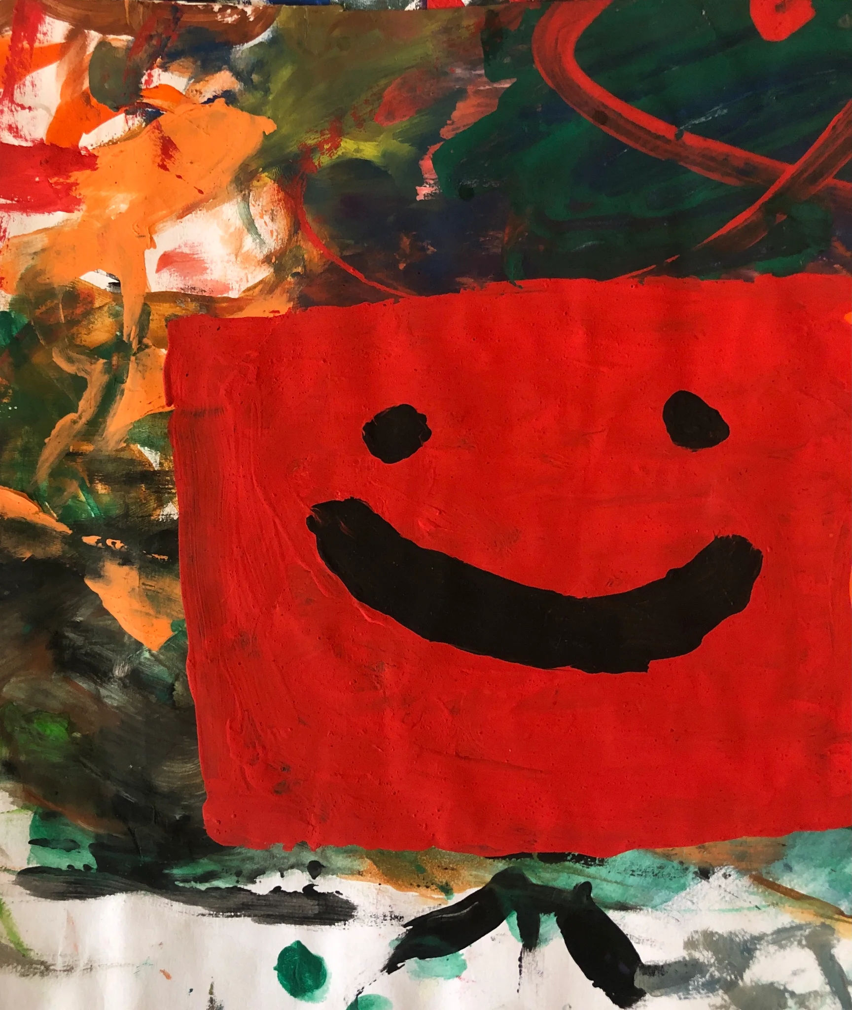 "smile on a red square"